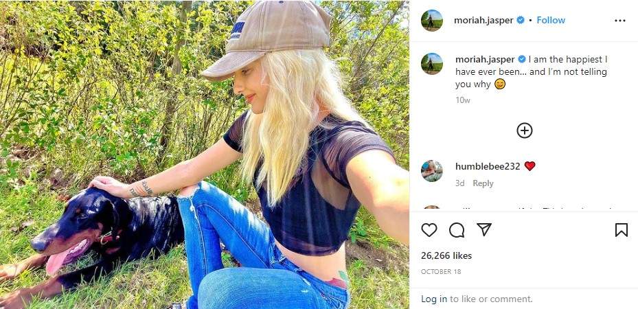 Moriah Plath's post on Instagram with her doberman.